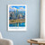 Panama City city view bordered print styled in White frame / blue sitting room; frame and props not included