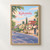 Kākināda city view full-bleed print styled in Front oak frame - corrected opening; frame and props not included