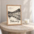 Tobermory harbour painted houses full-bleed print styled in Oak frame / bedside table; frame and props not included