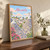 Alberobello Rione Monti trulli full-bleed print styled in Original angled oak-console; frame and props not included