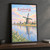 Kinderdijk windmills along the canal full-bleed print styled in Black frame / charcoal wall; frame and props not included