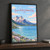 Torres del Paine from the base lagoon full-bleed print styled in Black frame / charcoal wall; frame and props not included