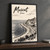 Muscat city view full-bleed print styled in Black frame / charcoal wall; frame and props not included