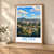 Betim city view bordered print styled in Light oak-console; frame and props not included