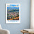 Turmero city view bordered print styled in White frame / blue sitting room; frame and props not included