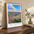 Ikot Ekpene city view bordered print styled in Original angled oak-console; frame and props not included