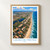 Lauro de Freitas city view bordered print styled in Front oak frame - corrected opening; frame and props not included