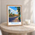 Jepara city view bordered print styled in Oak frame / bedside table; frame and props not included