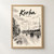 Korba city view full-bleed print styled in Front oak frame - corrected opening; frame and props not included