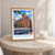 Manchester John Rylands Library exterior bordered print styled in Oak frame / bedside table; frame and props not included