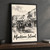 Mackinac Island Main Street full-bleed print styled in Black frame / charcoal wall; frame and props not included