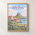 Lindisfarne Castle from the harbour full-bleed print styled in Front oak frame - corrected opening; frame and props not included
