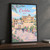 Cordoba Roman Bridge and Mezquita full-bleed print styled in Black frame / charcoal wall; frame and props not included