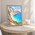 Porto Katsiki beach from the cliff stairs full-bleed print styled in Oak frame / bedside table; frame and props not included