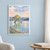 Wanaka lone willow from the lake shore full-bleed print styled in White frame / blue sitting room; frame and props not included