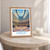 Leeds Corn Exchange curved frontage bordered print styled in Oak frame / bedside table; frame and props not included