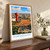 Ouagadougou city view bordered print styled in Original angled oak-console; frame and props not included