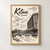 Kitwe city view full-bleed print styled in Front oak frame - corrected opening; frame and props not included