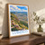 Lubango city view bordered print styled in Original angled oak-console; frame and props not included