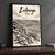 Lubango city view full-bleed print styled in Black frame / charcoal wall; frame and props not included