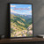 Shebenik National Park full-bleed print styled in Black frame / charcoal wall; frame and props not included