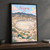 Nisyros full-bleed print styled in Black frame / charcoal wall; frame and props not included