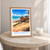 Canoa Quebrada bordered print styled in Oak frame / bedside table; frame and props not included