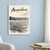Ammouliani full-bleed print styled in White frame / blue sitting room; frame and props not included