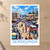 Serekunda city view bordered print styled in Unframed sheet - corrected A-series; frame and props not included