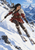 Dark-haired adult woman in a red winter coat skiing with poles down a snowy alpine slope, bow and quiver on her back.. Complete unframed artwork at full portrait size