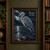 A silver-blue heron stands on a rock in the rain beside a dark river, with the title “Heron Beneath the Storm” above.; styling frame not included
