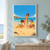 Three children build a decorated sand lighthouse on a beach, with a red bucket, surf, gulls, and a distant sailboat.; frame shown for styling only