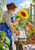 A woman in a cobalt apron holds a sunflower above a white enamel pitcher while a ginger cat watches on a leafy potting bench.
