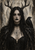 Dark-haired woman with branching antlers and black feathered clothing, beside a raven against a distressed dark background.