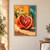 Large split red-fleshed citrus fruit with glossy droplets, white blossoms, and dark green leaves against orange and turquoise blocks.; frame shown for styling only