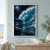 A large turquoise wave curls into white spray beneath a full moon and cloudy indigo sky.; frame shown for styling only