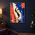 A tall black ribbon-like shadow splits into three curling tendrils, each ending in a white expression mask against cobalt, coral and ivory planes.; frame shown for styling only