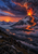 A snow-covered volcano erupts above a broad valley at dusk, with a tall ash plume, glowing lava fissures, snowy mountains, and a winding watercourse.