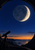 A large crescent Moon appears within a circular dark structure above a coastal horizon, with a silhouetted telescope at lower left.