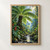 Large arching tree fern above a narrow rocky stream, surrounded by dense tropical foliage and red flower accents.; frame shown for styling only