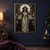 Three-faced crowned woman holding flames beneath a full moon, flanked by ravens and two black dogs.; frame shown for styling only