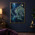 Teal amphibian-like fantasy creature with amber eyes, branching frills and a glowing lure rising at a moonlit waterline amid bubbles and plankton.; frame shown for styling only