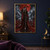 Armored woman in a patterned crimson cloak holding a pale mask on a red bridge beneath a large red moon, with birds, mist and ghostlike figures.; frame shown for styling only