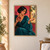 Woman with a short black bob holding a split pomegranate and looking at a seed in her open palm beside a window.; frame shown for styling only