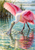 Pink-and-white spoonbill wading with partly open wings and sweeping its broad bill through reflective lagoon water.