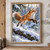 Russet red fox leaping above a snow-covered fallen log in a snowy forest, with pine branches and a snowflake near its nose.; frame shown for styling only