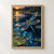 Blue dragonfly hovering over a dark pond with ripples, droplets, lily pads, and amber sunset light.; frame shown for styling only