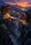 Two hikers reaching toward each other across a plank bridge over a deep ravine, with a lantern and sunset mountains.