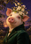 White-and-pink pig in a dark emerald jacket with copper clasp and blossom crown, against a purple orchard at sunset.