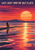 Silhouetted cyclist and bicycle on a narrow track across reflective salt flats beneath a large apricot sunset, with distant indigo mountains.